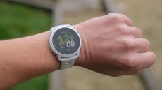 A close-up picture of our reviewer wearing the Coros Pace 4 watch