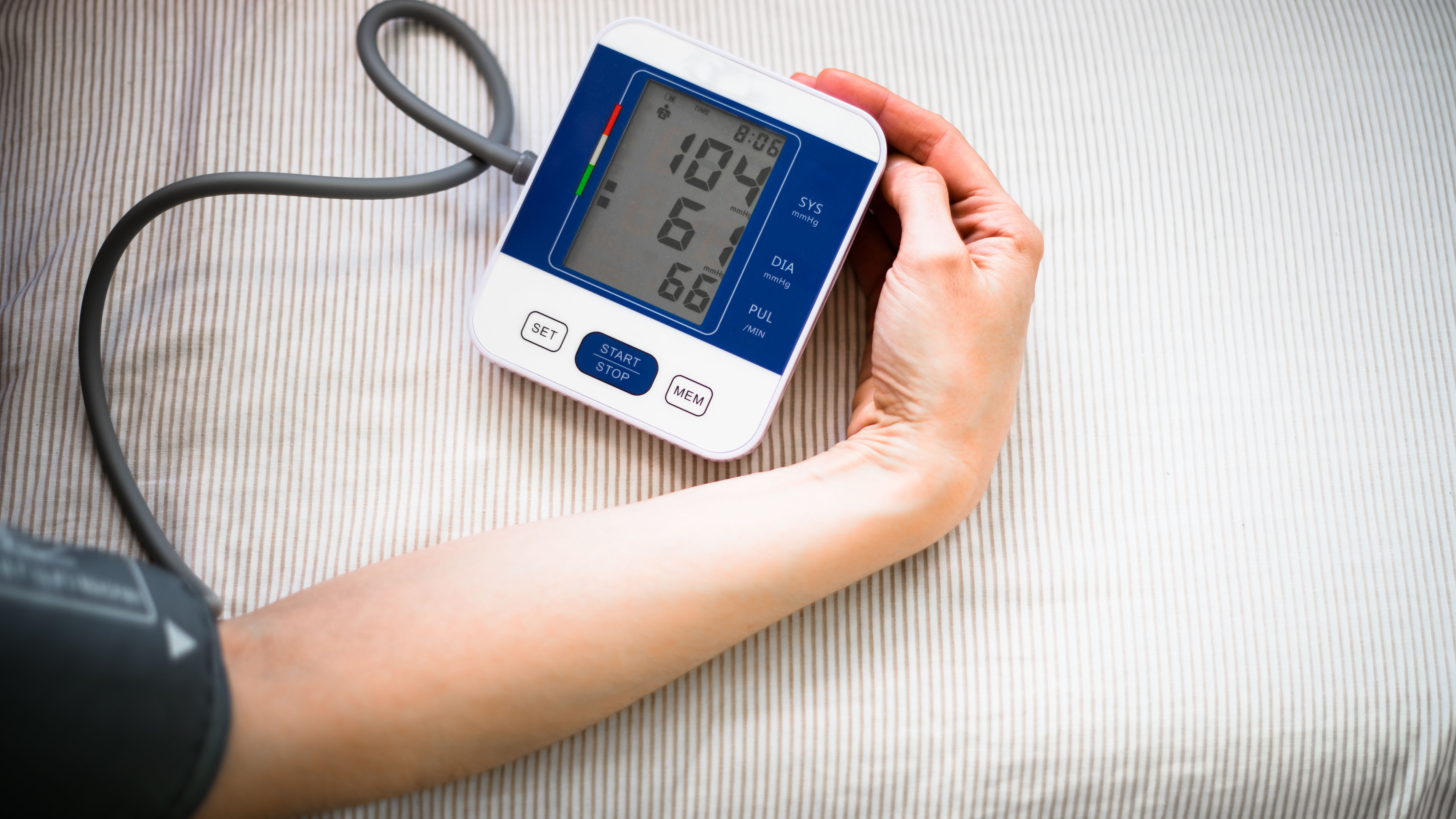 Person measuring blood pressure