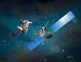 An artist's illustration of a satellite servicing spacecraft approaching its target. DARPA has selected Space Systems Loral as its commercial partner for the agency's Robotic Servicing of Geosynchronous Satellites program.