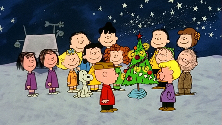 Peanuts gathered around Christmas tree